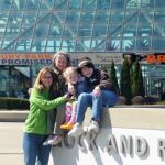Heather and the kids in front of the Hall of Fame.