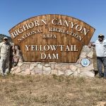 Wick and I at the Bighorn National sign